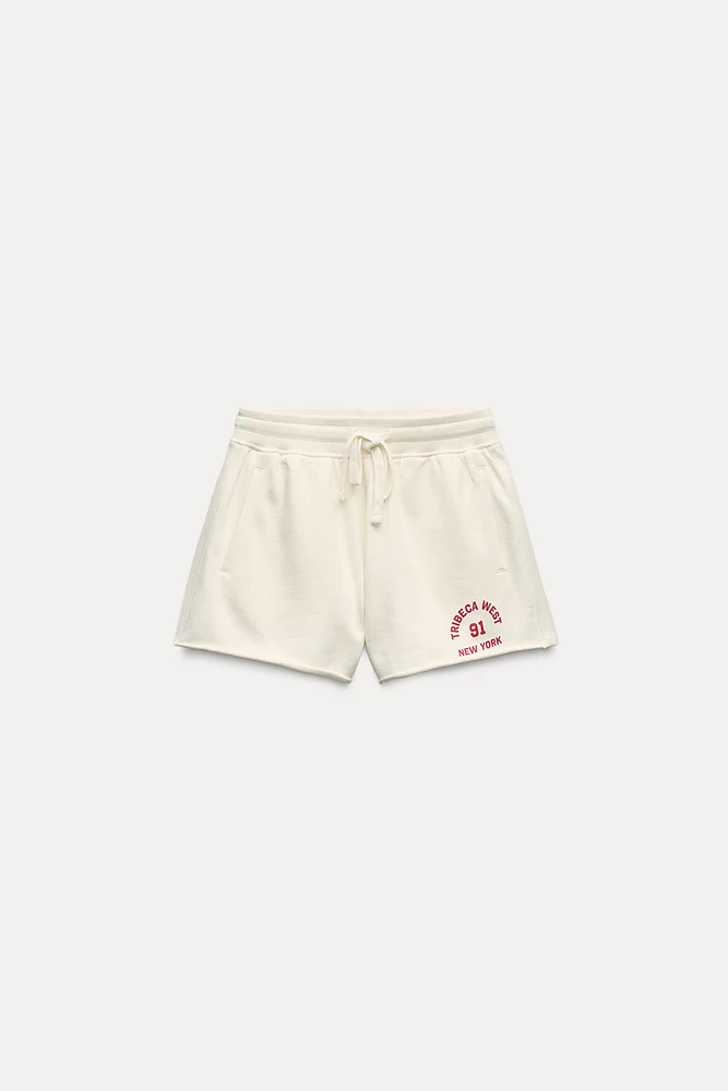 TEXT PLUSH SHORTS