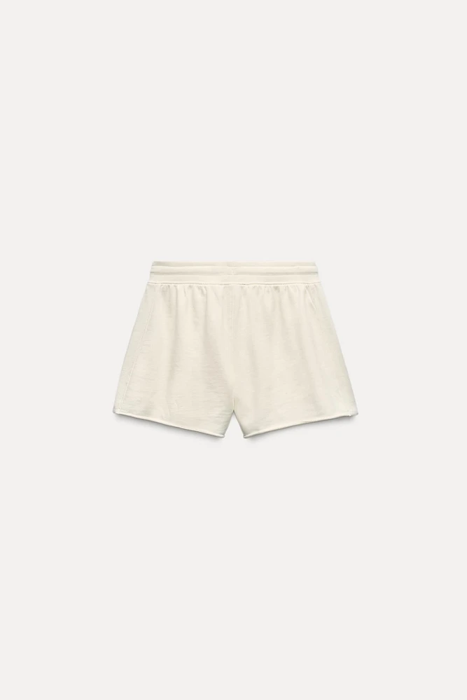 TEXT PLUSH SHORTS