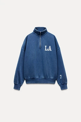 WASHED EFFECT VARSITY POLO SWEATSHIRT