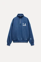 WASHED EFFECT VARSITY POLO SWEATSHIRT