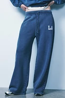 WASHED EFFECT VARSITY JOGGER PANTS