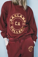 WASHED EFFECT VARSITY SWEATSHIRT