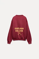 WASHED EFFECT VARSITY SWEATSHIRT