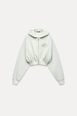 WASHED EFFECT HOODED CROP TEXT SWEATSHIRT