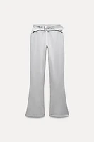 BELTED FLARED INTERLOCK PANTS