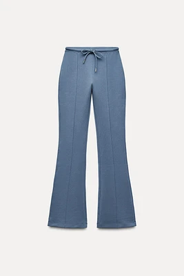 FLARE INTERLOCK PANTS WITH SEAMS