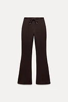 FLARE INTERLOCK PANTS WITH SEAMS