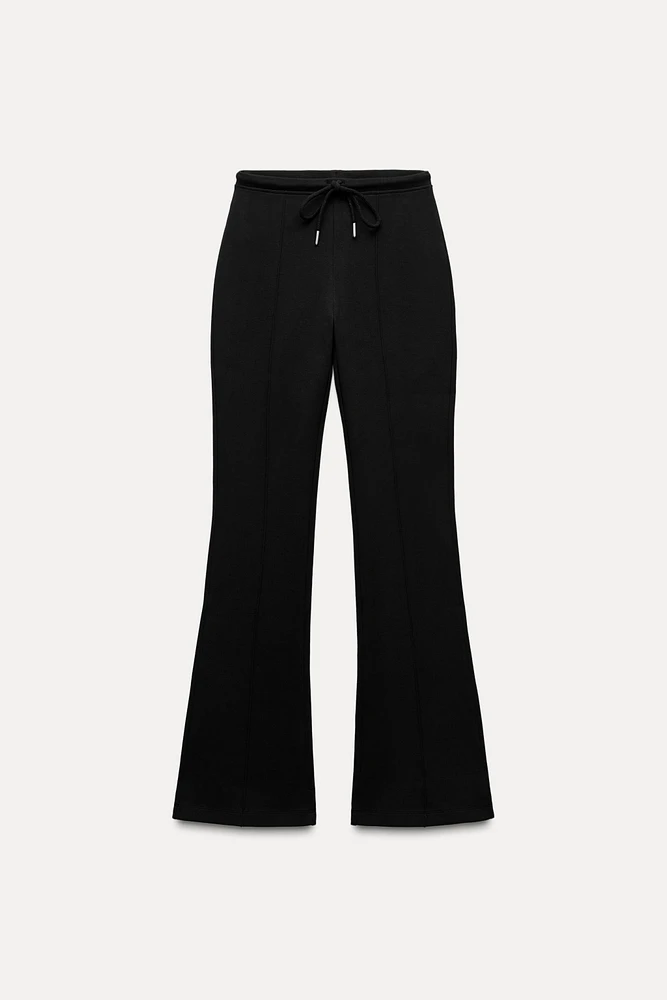 FLARE INTERLOCK PANTS WITH SEAMS