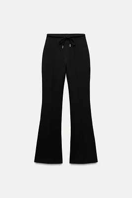 FLARE INTERLOCK PANTS WITH SEAMS