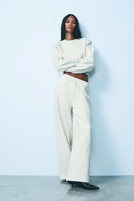 CROPPED INTERLOCK SWEATSHIRT