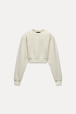 CROPPED INTERLOCK SWEATSHIRT