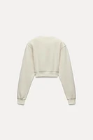 CROPPED INTERLOCK SWEATSHIRT