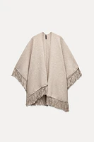 FRINGED KNIT CAPE