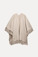 FRINGED KNIT CAPE