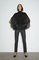 TURTLENECK KNIT FRINGED CAPE