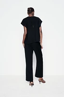 LONG BELTED JUMPSUIT