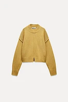 PRONOUNCED SEAM KNIT SWEATER