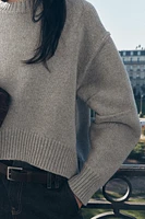 PLEATED SLEEVE KNIT SWEATER