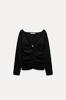 DRAPED KNIT BOBBLE APPLIQUÉ TOP