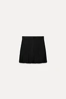 BOX PLEAT KNIT MINI SKIRT