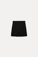 BOX PLEAT KNIT MINI SKIRT