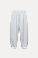 PLUSH TEXT JOGGER PANTS