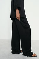 WRINKLED EFFECT WIDE LEG PANTS