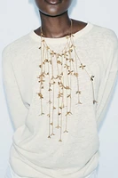 CASCADING FLOWER NECKLACE