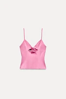 CUT OUT ELASTIC TOP WITH BOWS