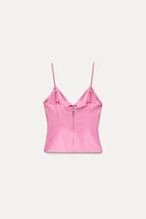 CUT OUT ELASTIC TOP WITH BOWS