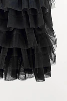 Mini skirt with a mid elastic waistband. Tulle ruffle details. Matching interior lining.<br/><br/>Halloween special collection.