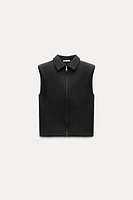 ZIPPERED SHOULDER PAD VEST