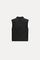 ZIPPERED SHOULDER PAD VEST