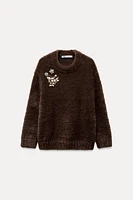 FAUX FUR KNIT SWEATER WITH BROOCHES