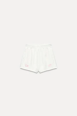 TEXT PLUSH SHORTS