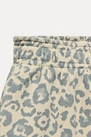 WASHED EFFECT ANIMAL PRINT PANTS