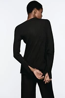 ASYMMETRIC RIB KNIT SWEATER