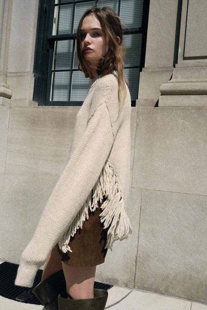 FRINGED KNIT SWEATER