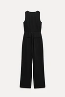 ASYMMETRIC VEST JUMPSUIT