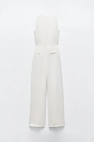 ASYMMETRIC CREPE VEST JUMPSUIT