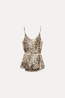 ZARA WOMAN COLLECTION<br/><br/>Top with draped neckline and spaghetti straps. Adjustable tied self belt. Asymmetric hem.