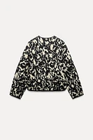 ANIMAL PRINT PUFFER JACKET