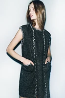 KNIT VEST WITH SEQUINS AND PASSEMENTERIE