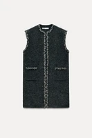 KNIT VEST WITH SEQUINS AND PASSEMENTERIE