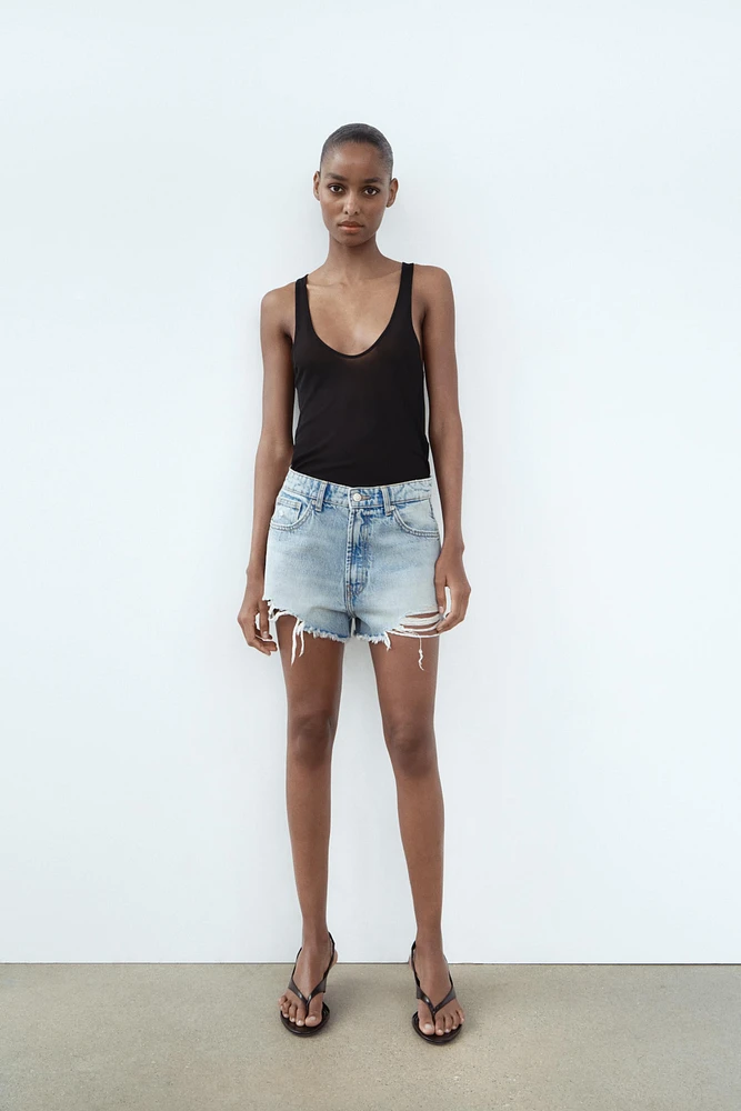 TRF HIGH WAIST RIPPED CURVED DENIM SHORTS