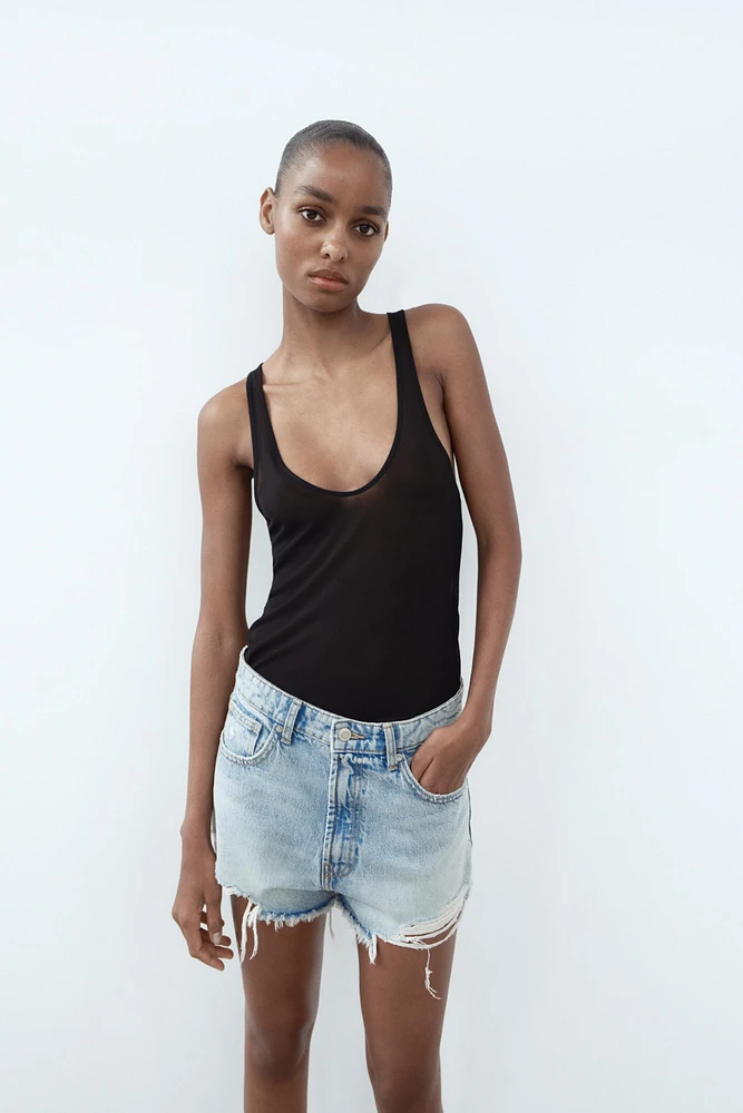 TRF HIGH WAIST RIPPED CURVED DENIM SHORTS