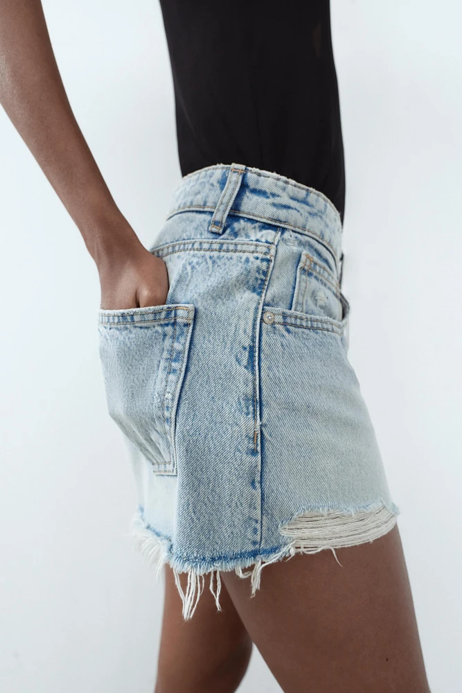 TRF HIGH WAIST RIPPED CURVED DENIM SHORTS