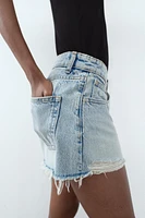 TRF HIGH WAIST RIPPED CURVED DENIM SHORTS