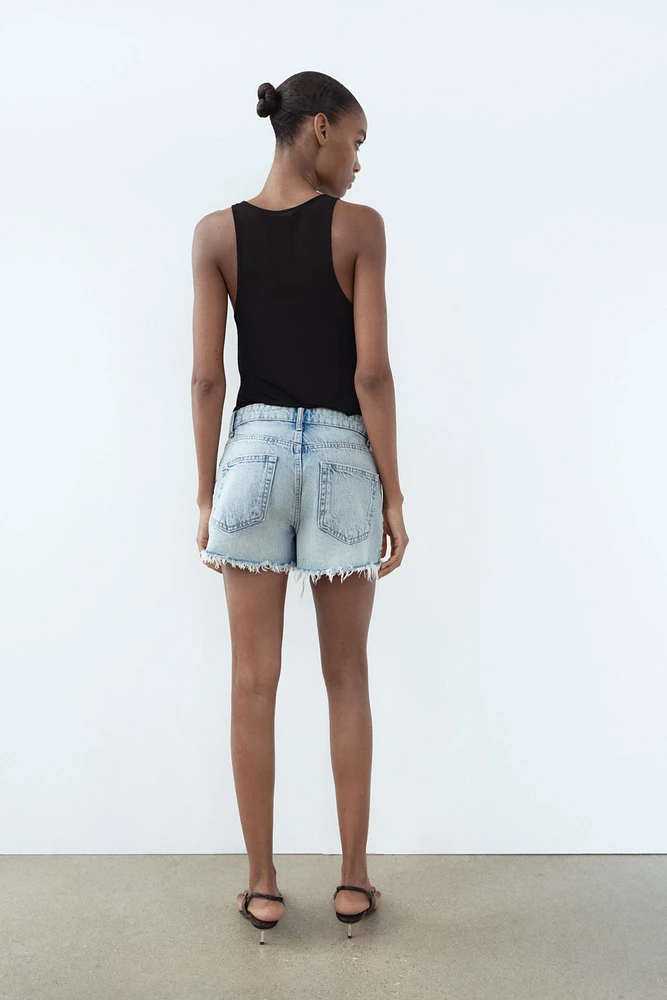 TRF HIGH WAIST RIPPED CURVED DENIM SHORTS