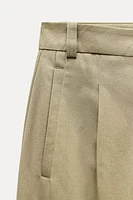 PLEATED BAGGY PANTS